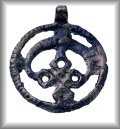 Openwork pendant embellished with a lunula motif, bronze