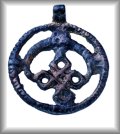 Openwork pendant embellished with a lunula motif, bronze